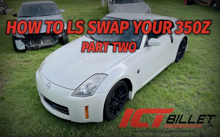 ICT Billet's White Nissan 350Z sits in the grass in front of a few other cars